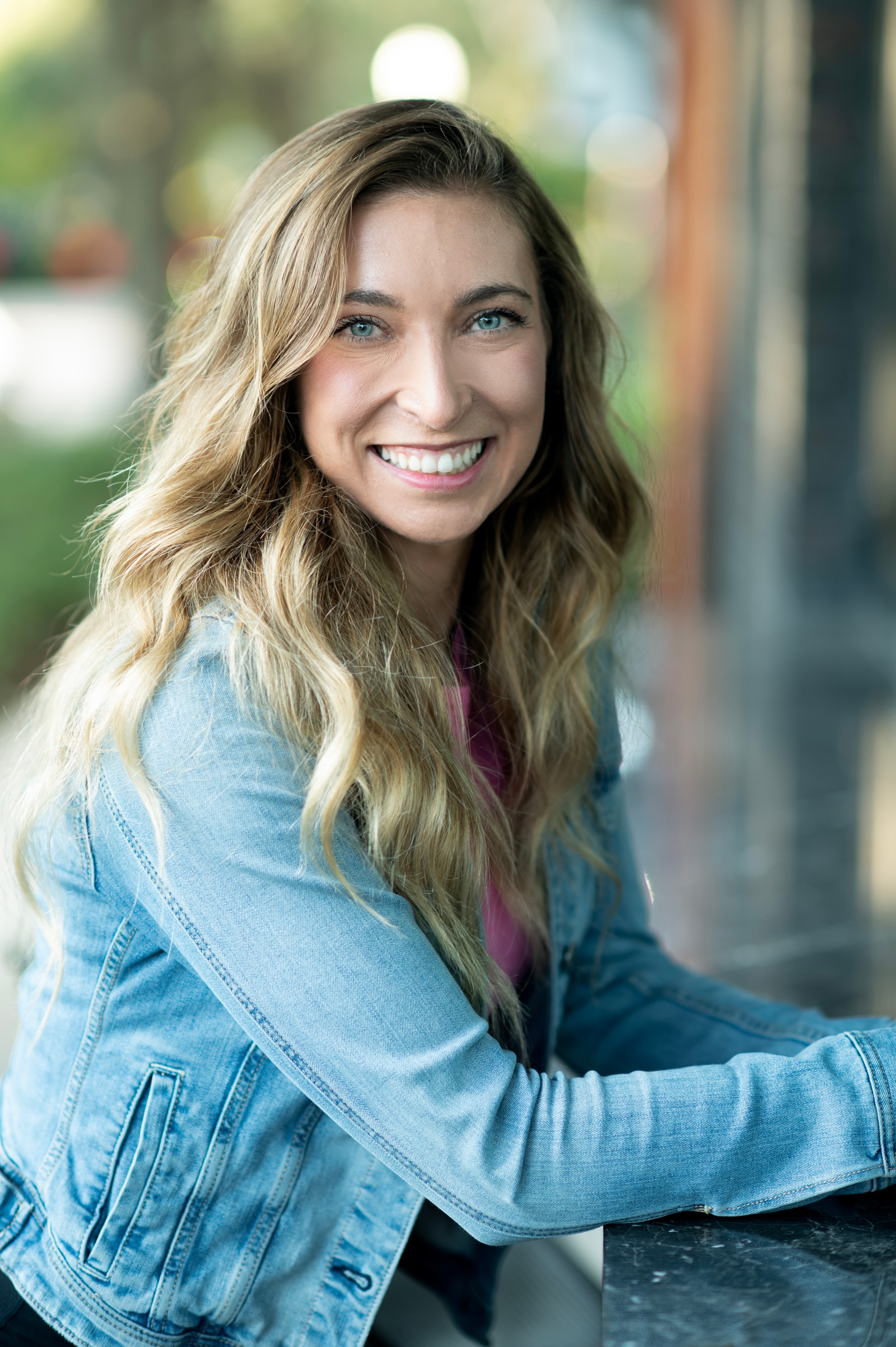 Sarah Farrell in a polished headshot for her modeling and acting portfolio
